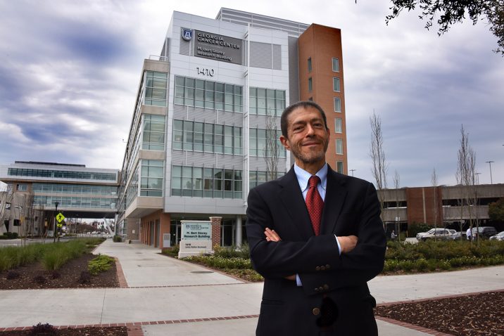 Doctor in front of building