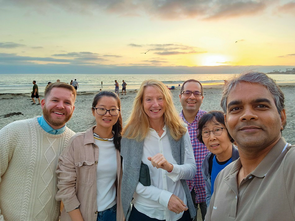Dr. Hedrick and lab at beach 