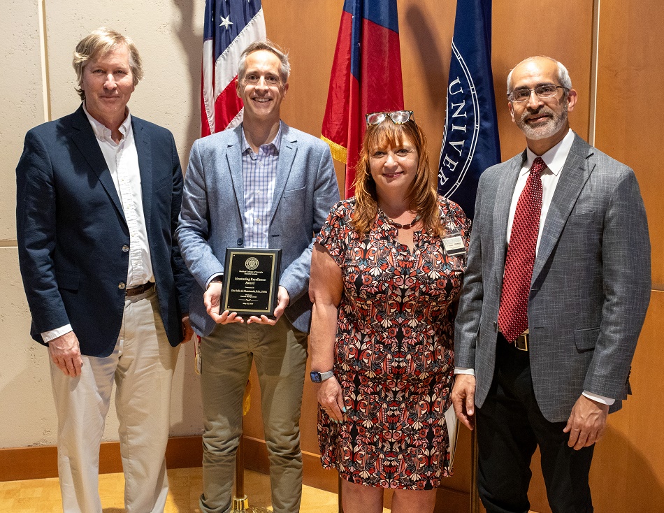 Faculty Senate Award Ceremony                 (l-r) Dr. David Hess, Dean of Medical College of Georgia  Dr. Eric Belin de Chantemele Dr. Lara Stepleman, Associate Dean for Faculty Success                               Dr. Vishal Arora, Professor of Medicine, Division of Cardiology