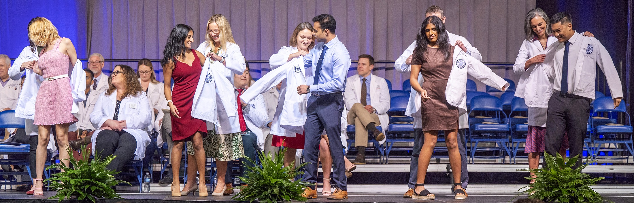 Students receiving their white coat