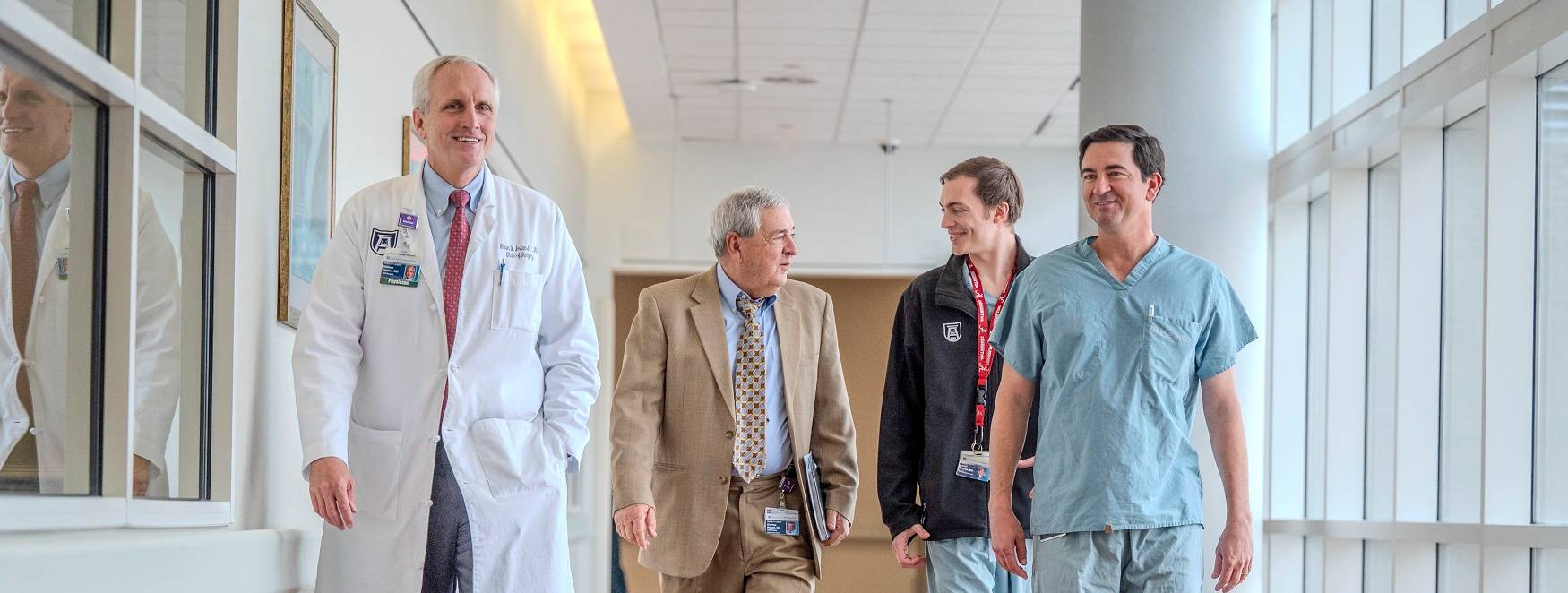Surgery members walking in hallway