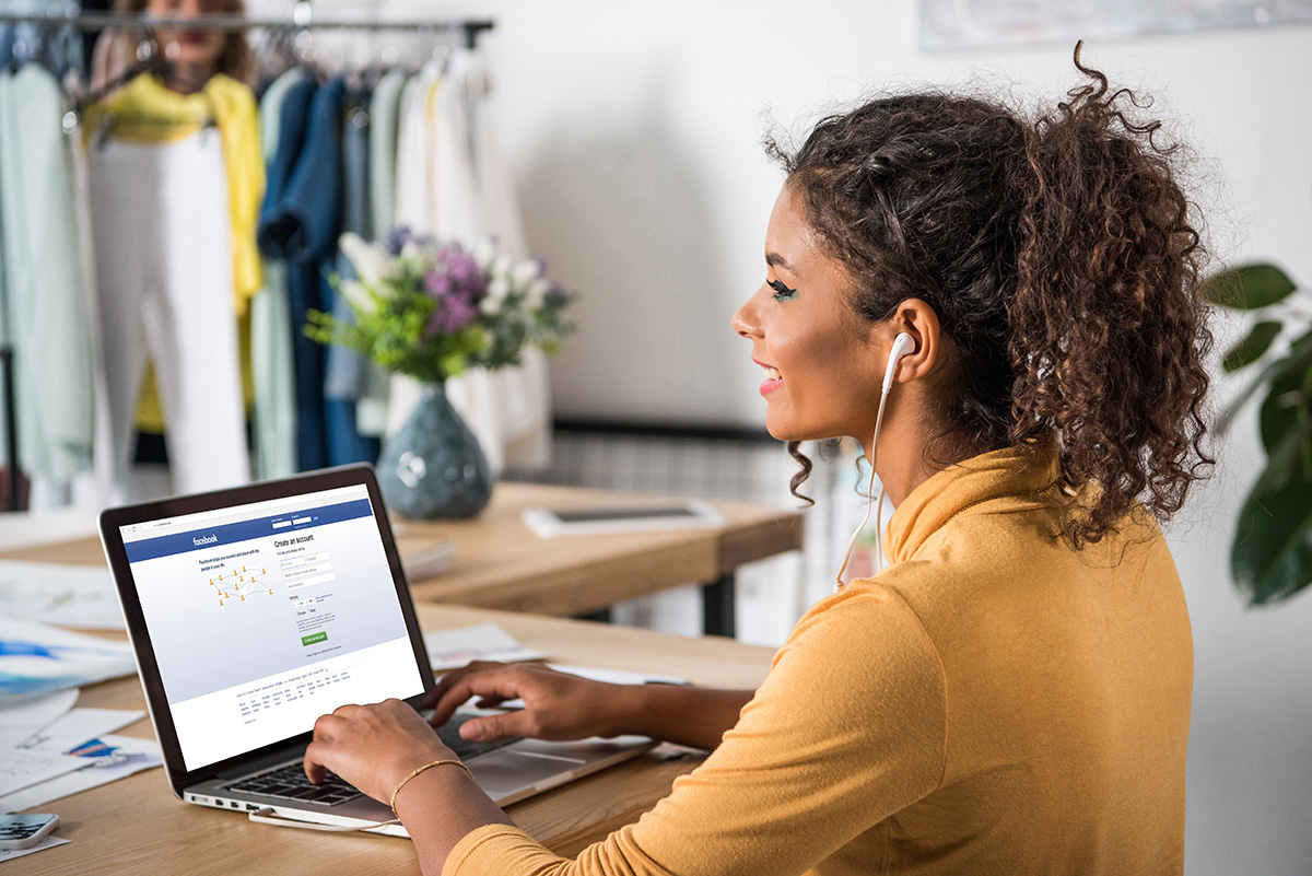 Social Media - Professional looking woman at a laptop
