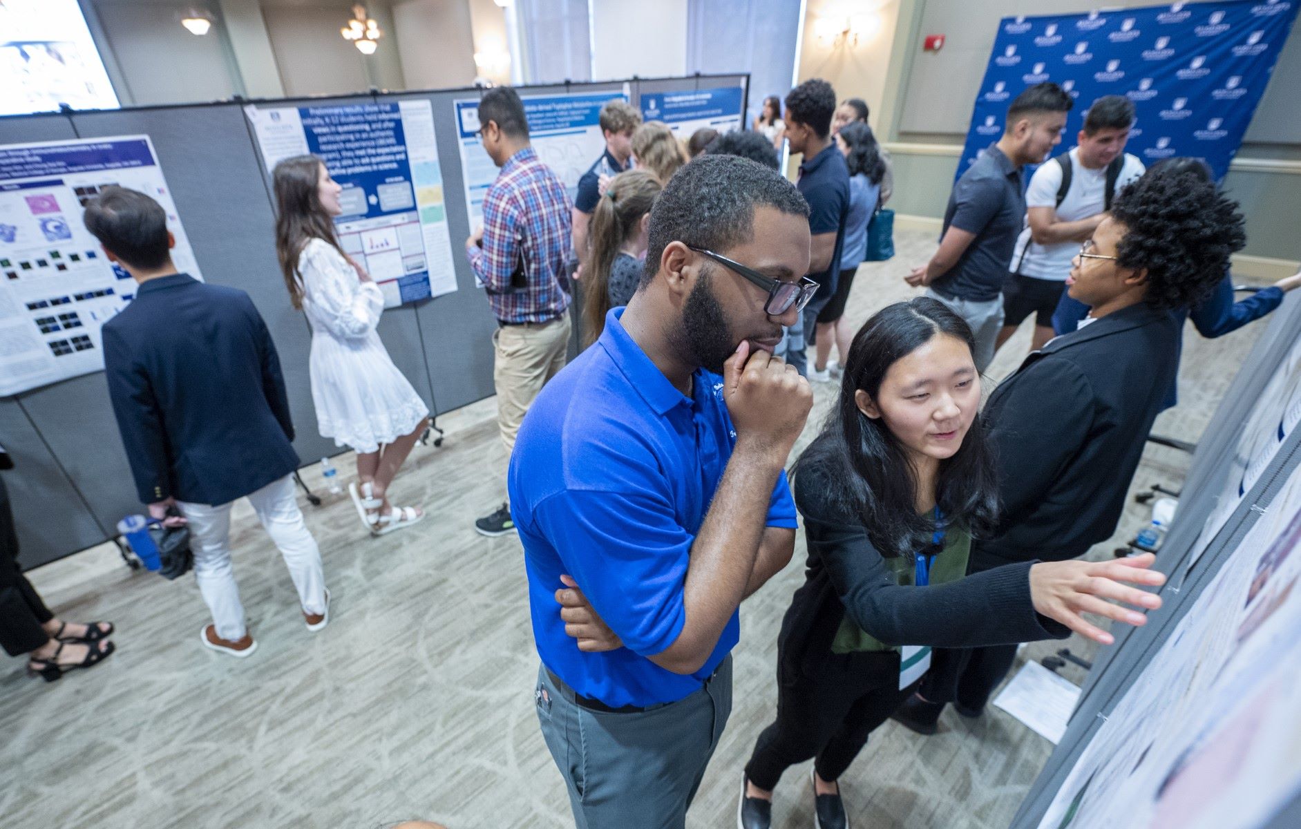 Students presenting at the conference