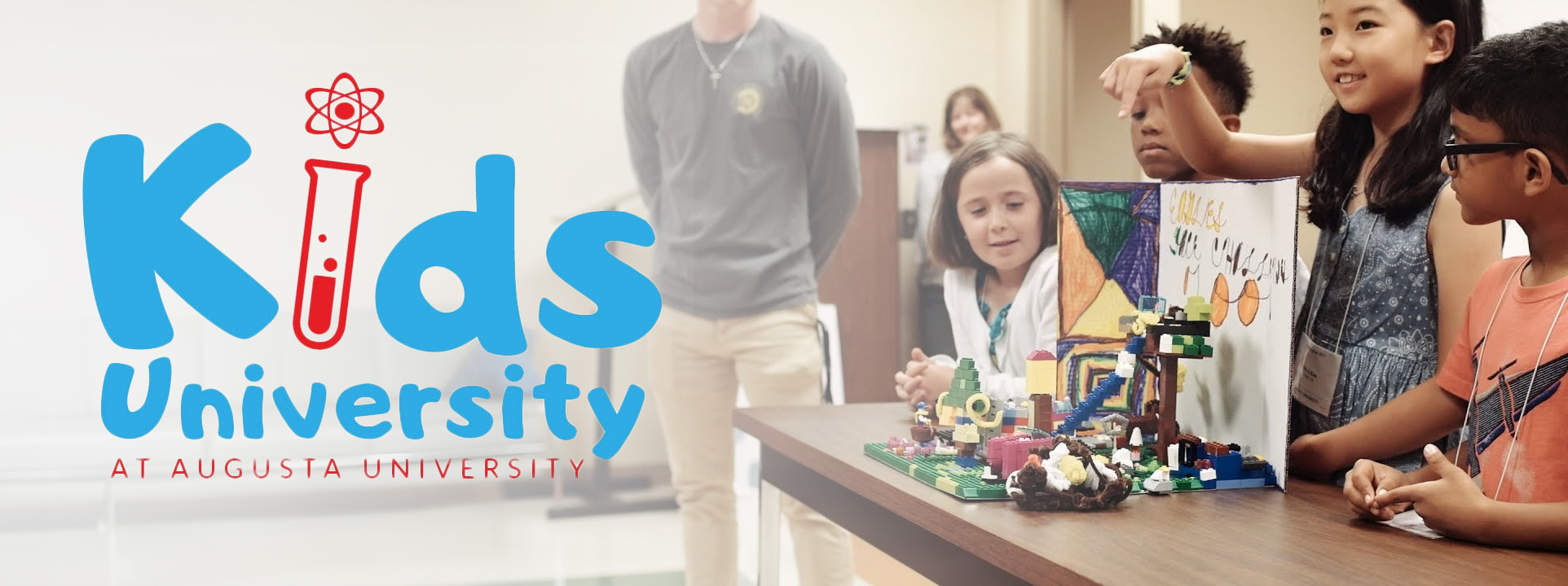 Participants in Kids University presenting their work