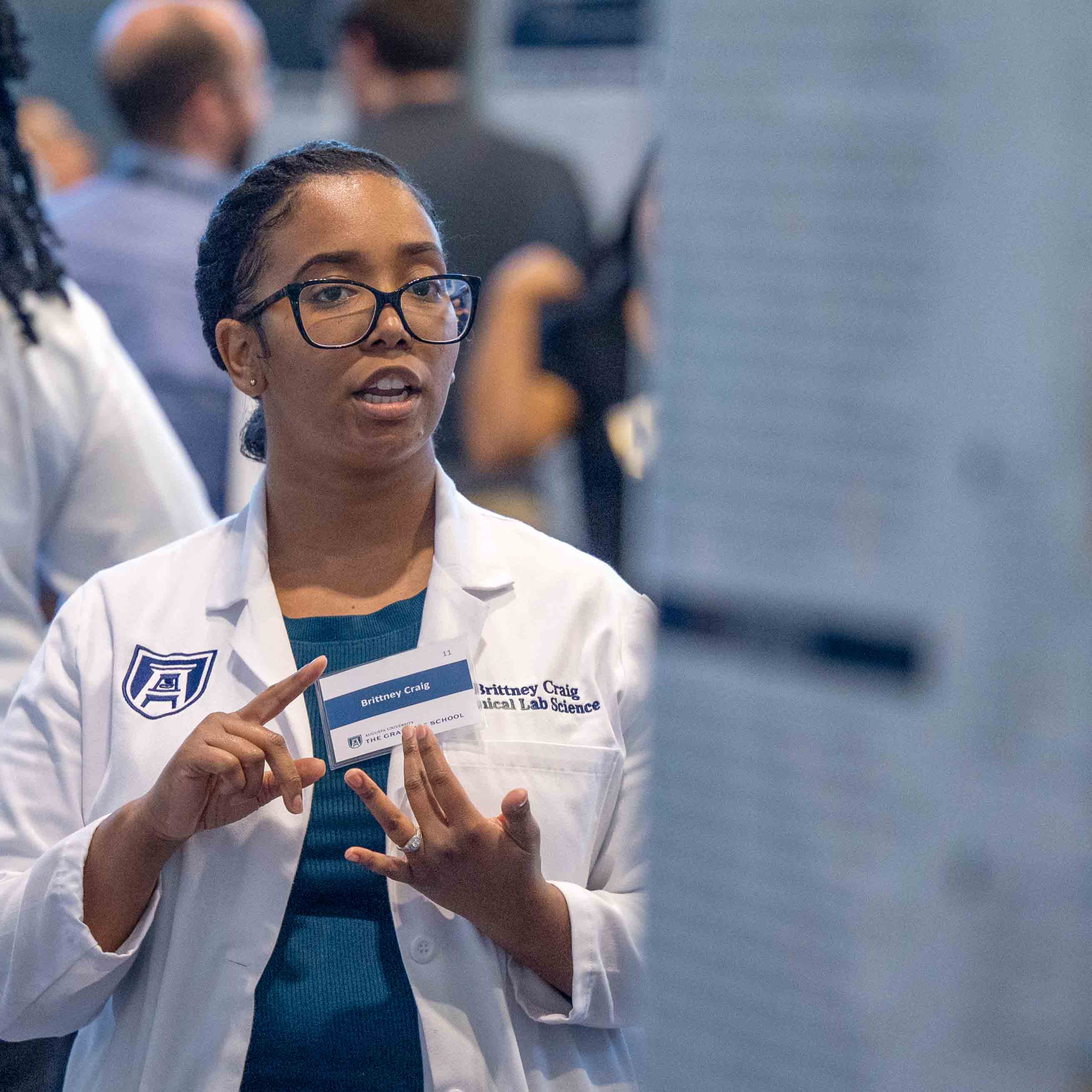Student Presenting Poster