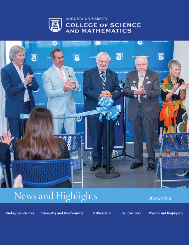 CSM 2023/2024 Magazine Cover of an opening ceremony where a group cuts a ribbon to celebrate a new research space opening