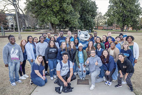 A group of students from orientation with Augustus